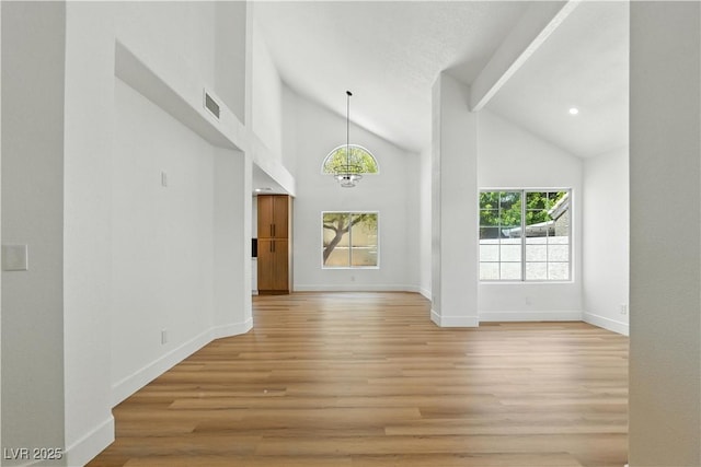 2105 Madagascar Ln, Las Vegas, NV 89117 - spare room with vaulted ceiling, light wood-style flooring, and recessed lighting