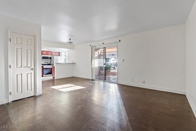 5200 Indian River Dr Unit 301, Las Vegas, NV 89103 - unfurnished living room featuring dark wood-type flooring