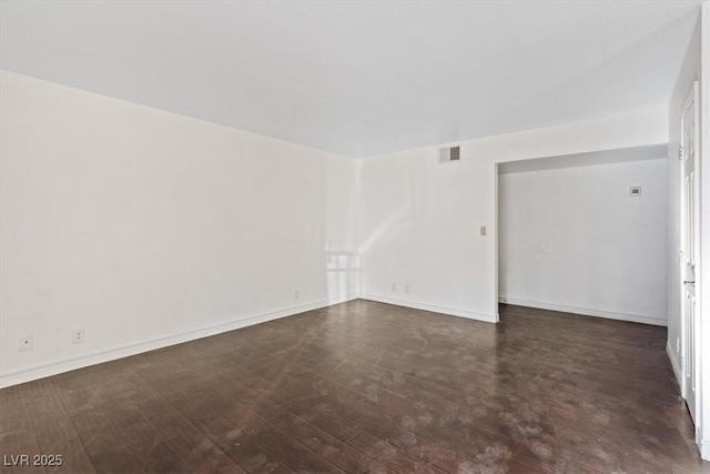 5200 Indian River Dr Unit 301, Las Vegas, NV 89103 - empty room with dark wood-type flooring and baseboards