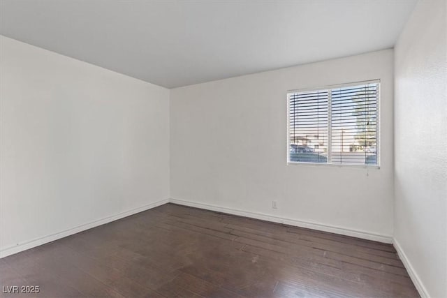 5200 Indian River Dr Unit 301, Las Vegas, NV 89103 - empty room with dark wood-type flooring and baseboards