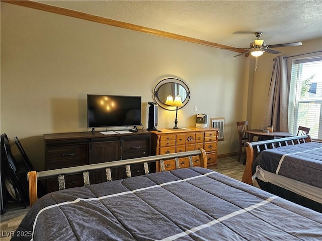 223 Hunter Ridge Rd Unit 121, Brian Head, UT 84719 - bedroom featuring a textured ceiling and wood finished floors