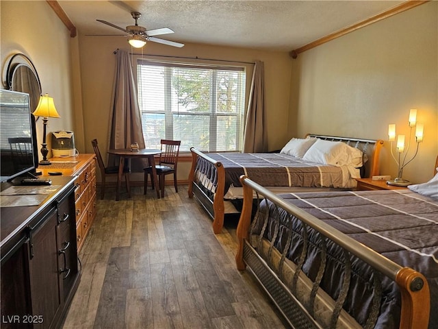 223 Hunter Ridge Rd Unit 121, Brian Head, UT 84719 - bedroom featuring dark wood-type flooring, ornamental molding, and a textured ceiling