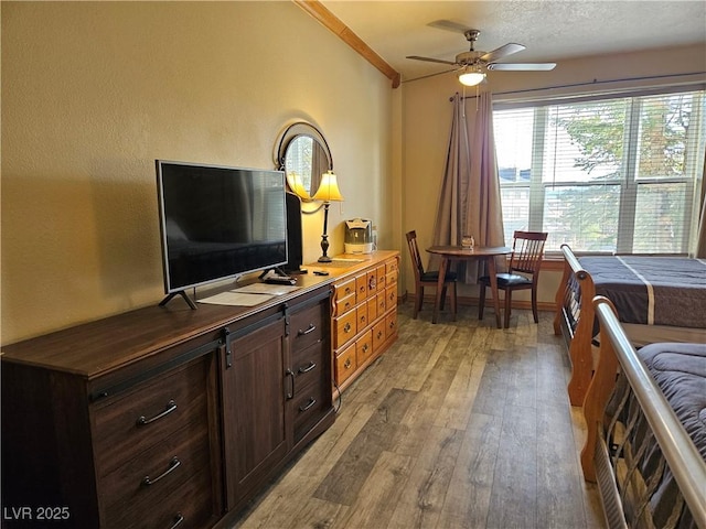 223 Hunter Ridge Rd Unit 121, Brian Head, UT 84719 - bedroom with light wood-style floors and crown molding