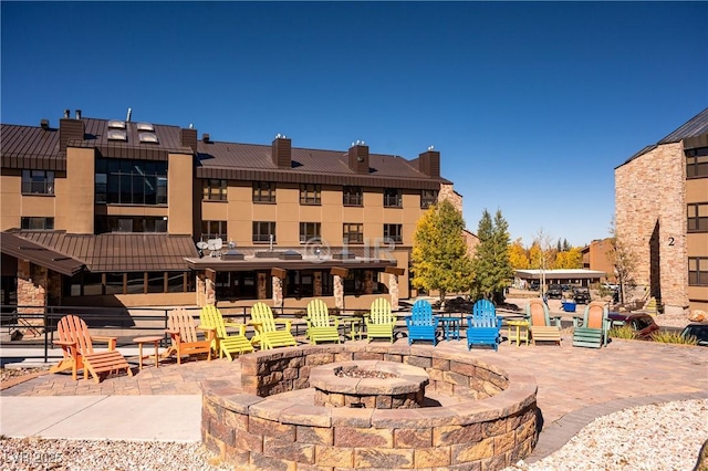 223 Hunter Ridge Rd Unit 121, Brian Head, UT 84719 - view of patio with a fire pit