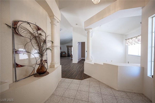 9632 Spanish Steps Ln, Las Vegas, NV 89117 - hall with ornate columns and light tile patterned floors