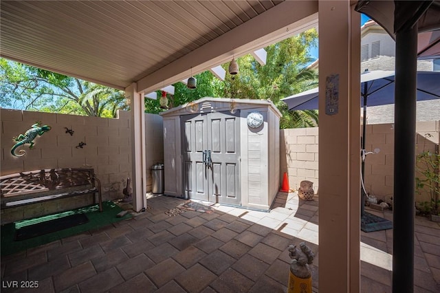 9632 Spanish Steps Ln, Las Vegas, NV 89117 - fenced backyard featuring a patio and a storage shed