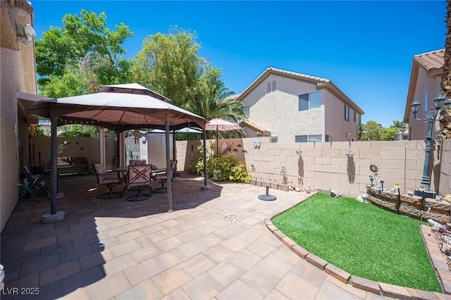9632 Spanish Steps Ln, Las Vegas, NV 89117 - fenced backyard with a gazebo and a patio