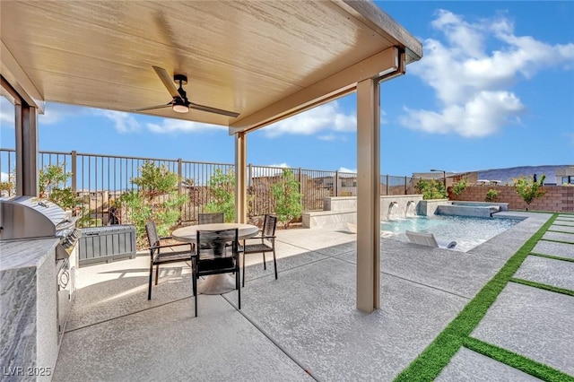 818 Calluna St, Las Vegas, NV 89138 - fenced backyard with a patio, area for grilling, outdoor dining area, and a ceiling fan