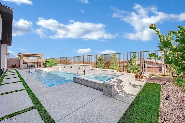 818 Calluna St, Las Vegas, NV 89138 - view of pool with an in-ground hot tub, a patio area, and a fenced backyard