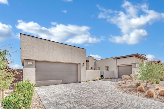 818 Calluna St, Las Vegas, NV 89138 - view of front facade featuring stucco siding and driveway