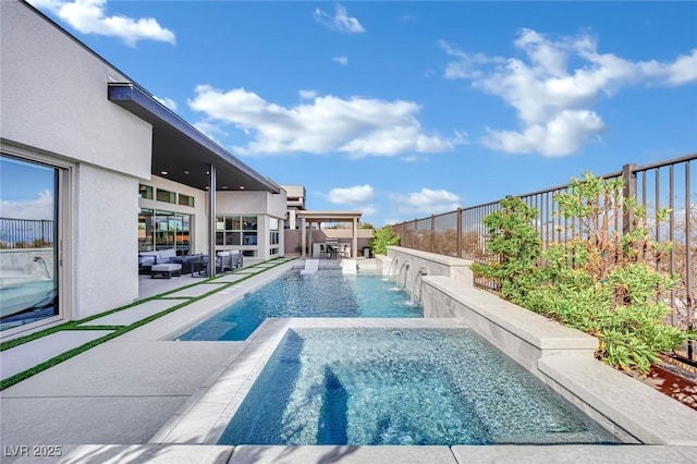 818 Calluna St, Las Vegas, NV 89138 - view of pool with an in-ground hot tub, outdoor lounge area, a patio area, and a fenced backyard