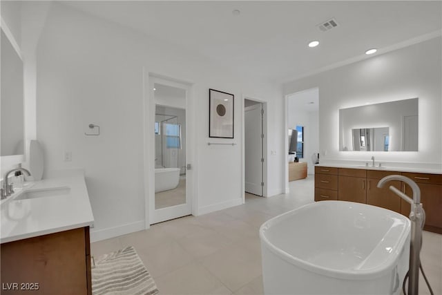 818 Calluna St, Las Vegas, NV 89138 - bathroom with vanity, a soaking tub, and recessed lighting