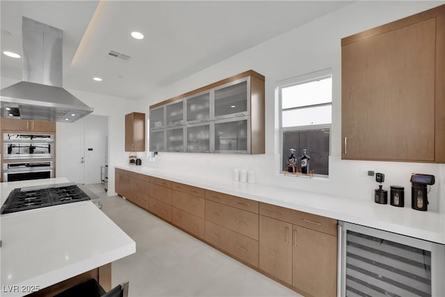 818 Calluna St, Las Vegas, NV 89138 - kitchen featuring wine cooler, island range hood, gas stovetop, light countertops, and recessed lighting
