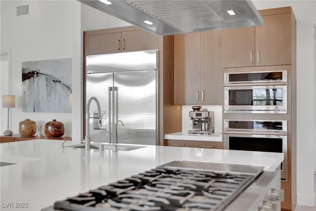 818 Calluna St, Las Vegas, NV 89138 - kitchen featuring appliances with stainless steel finishes and light countertops
