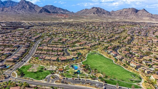 818 Calluna St, Las Vegas, NV 89138 - aerial view of property and surrounding area with nearby suburban area and a mountainous background
