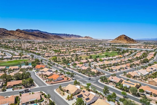 9704 Brawley Dr, Las Vegas, NV 89134 - aerial perspective of suburban area with mountains and a local golf course