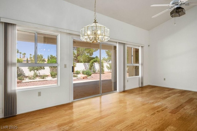 9704 Brawley Dr, Las Vegas, NV 89134 - unfurnished dining area featuring plenty of natural light, light wood-style floors, and a chandelier