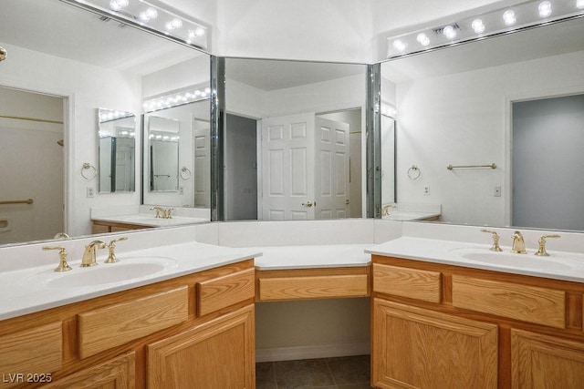 9704 Brawley Dr, Las Vegas, NV 89134 - bathroom featuring double vanity and tile patterned flooring