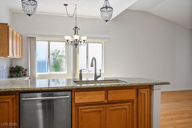 9704 Brawley Dr, Las Vegas, NV 89134 - kitchen featuring stainless steel dishwasher, a chandelier, light wood-type flooring, healthy amount of natural light, and lofted ceiling