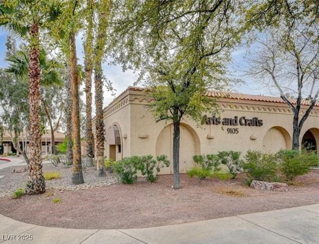 9704 Brawley Dr, Las Vegas, NV 89134 - view of front facade with stucco siding