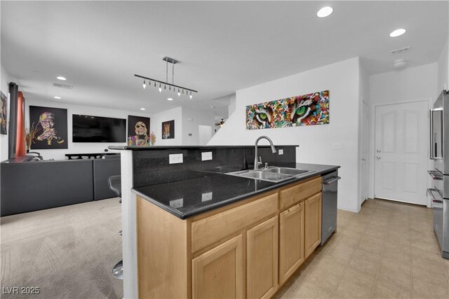 10045 Natchez Trace St, Las Vegas, NV 89178 - kitchen with a kitchen island with sink, open floor plan, rail lighting, light tile patterned floors, and dishwasher