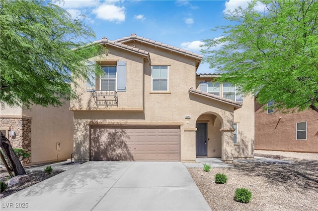 10045 Natchez Trace St, Las Vegas, NV 89178 - view of front of house featuring stucco siding, an attached garage, concrete driveway, and a tiled roof
