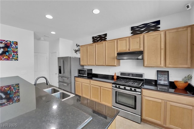 10045 Natchez Trace St, Las Vegas, NV 89178 - kitchen featuring stainless steel appliances, under cabinet range hood, light brown cabinetry, dark stone counters, and recessed lighting