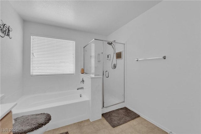 10045 Natchez Trace St, Las Vegas, NV 89178 - bathroom with vanity, a bath, and a shower stall