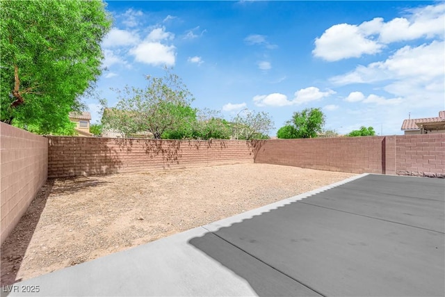 10045 Natchez Trace St, Las Vegas, NV 89178 - fenced backyard featuring a patio