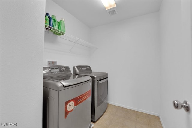 10045 Natchez Trace St, Las Vegas, NV 89178 - washroom featuring independent washer and dryer and light tile patterned floors