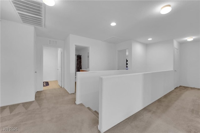 10045 Natchez Trace St, Las Vegas, NV 89178 - hallway featuring an upstairs landing, light colored carpet, and recessed lighting