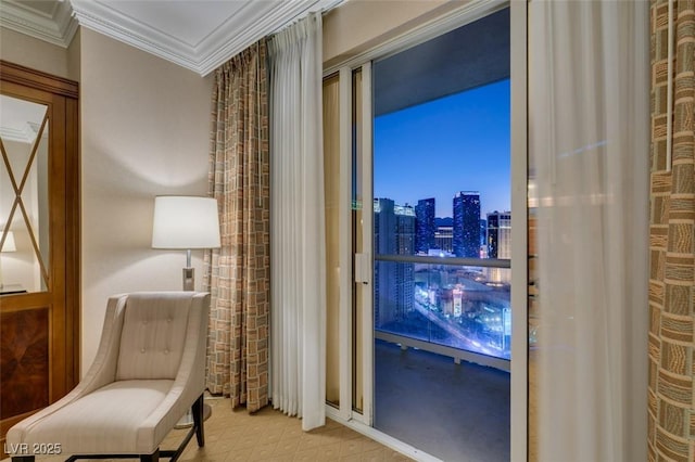 135 E Harmon Ave Unit 2821, Las Vegas, NV 89109 - living area featuring a skyline view and ornamental molding