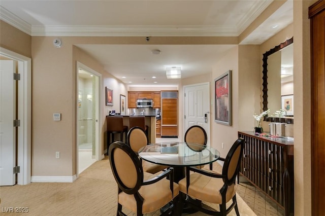 135 E Harmon Ave Unit 2821, Las Vegas, NV 89109 - dining area featuring recessed lighting and crown molding