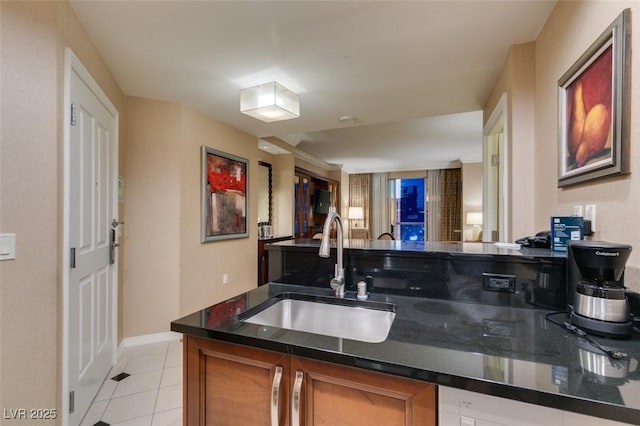 135 E Harmon Ave Unit 2821, Las Vegas, NV 89109 - bar area with a sink and light tile patterned flooring