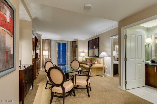 135 E Harmon Ave Unit 2821, Las Vegas, NV 89109 - dining area with crown molding and light carpet