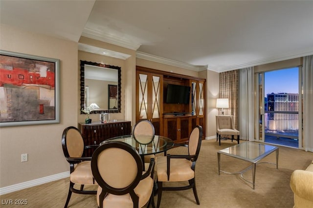 135 E Harmon Ave Unit 2821, Las Vegas, NV 89109 - dining area with crown molding and baseboards