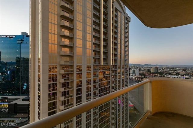 135 E Harmon Ave Unit 2821, Las Vegas, NV 89109 - balcony at dusk with a view of city