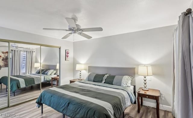 3145 E Flamingo Rd Unit 1045, Las Vegas, NV 89121 - bedroom featuring wood finished floors, a closet, and a ceiling fan