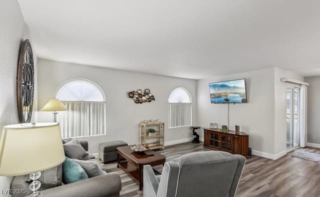 3145 E Flamingo Rd Unit 1045, Las Vegas, NV 89121 - living room with wood finished floors and healthy amount of natural light