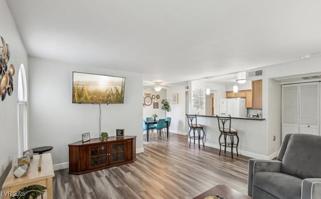 3145 E Flamingo Rd Unit 1045, Las Vegas, NV 89121 - living area with wood finished floors and baseboards