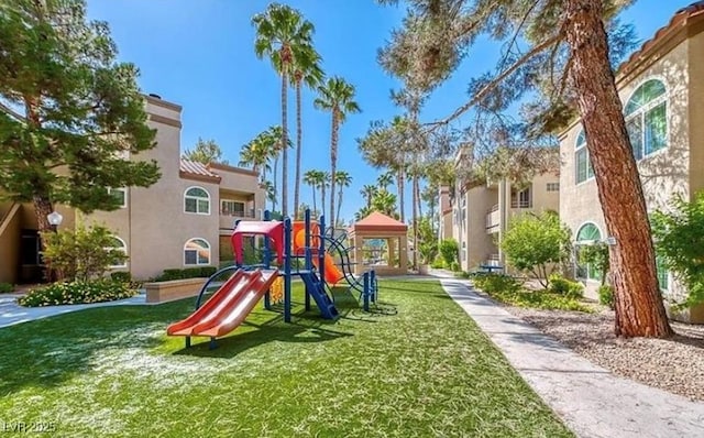 3145 E Flamingo Rd Unit 1045, Las Vegas, NV 89121 - communal playground featuring a lawn and a gazebo