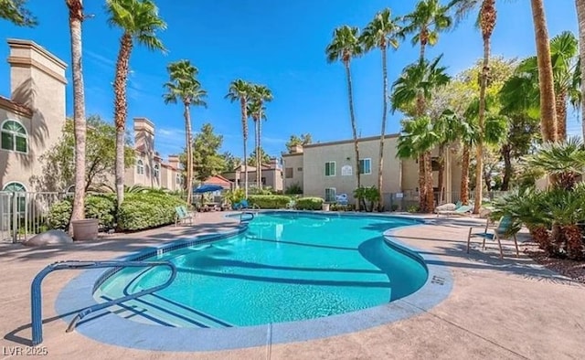 3145 E Flamingo Rd Unit 1045, Las Vegas, NV 89121 - community pool featuring a residential view