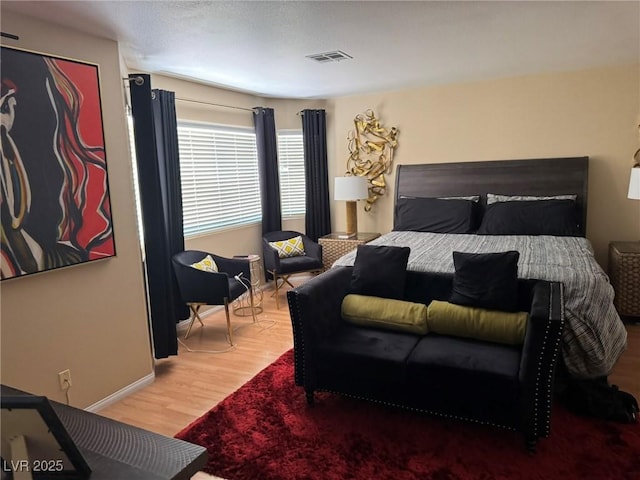 8225 Bermuda Beach Dr, Las Vegas, NV 89128 - bedroom featuring wood finished floors and baseboards
