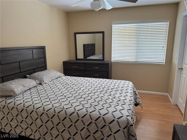 8225 Bermuda Beach Dr, Las Vegas, NV 89128 - bedroom featuring light wood-style floors and a ceiling fan