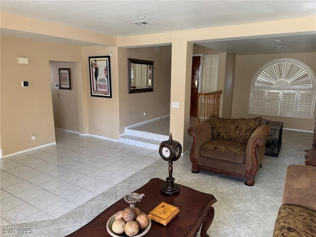 8225 Bermuda Beach Dr, Las Vegas, NV 89128 - living room with light tile patterned floors and baseboards