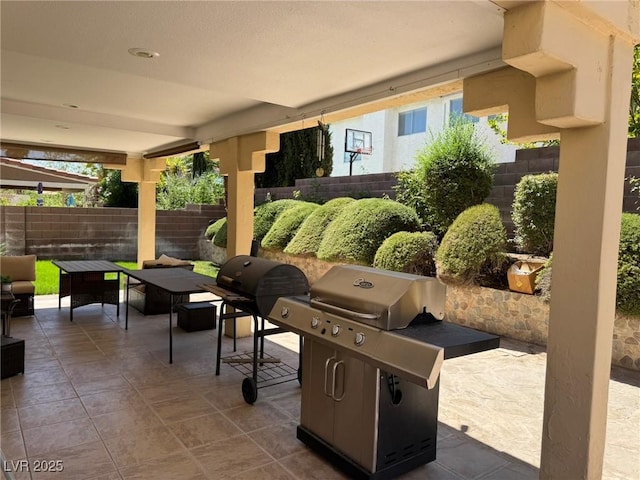 8225 Bermuda Beach Dr, Las Vegas, NV 89128 - fenced backyard featuring a grill and a patio