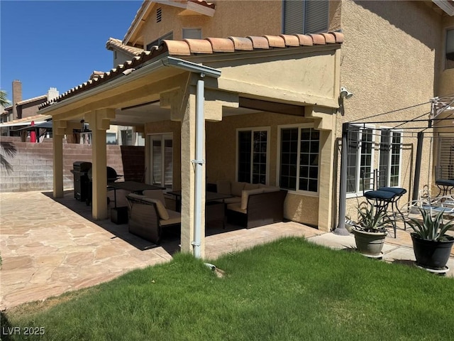 8225 Bermuda Beach Dr, Las Vegas, NV 89128 - back of property with a patio, an outdoor living space, stucco siding, and a tile roof