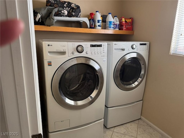 8225 Bermuda Beach Dr, Las Vegas, NV 89128 - washroom featuring washer and dryer and baseboards