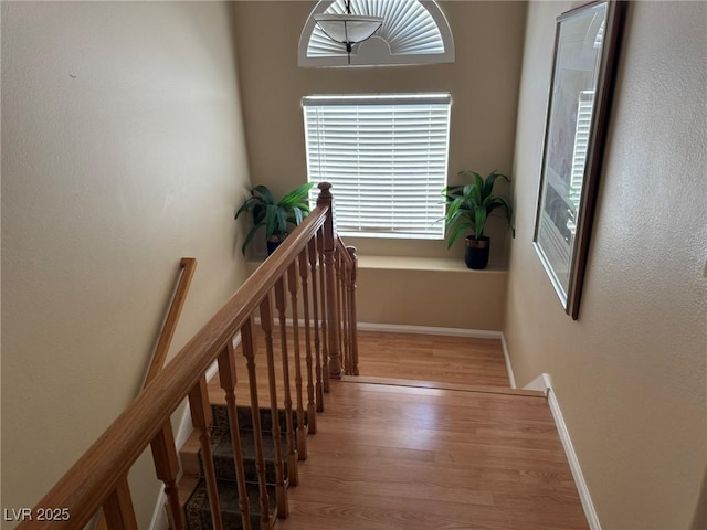 8225 Bermuda Beach Dr, Las Vegas, NV 89128 - staircase featuring wood finished floors and baseboards
