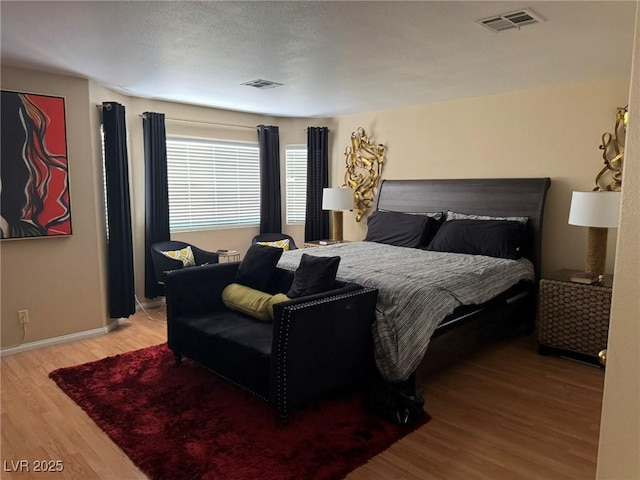 8225 Bermuda Beach Dr, Las Vegas, NV 89128 - bedroom featuring wood finished floors and baseboards